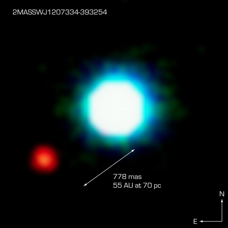 An image of a very faint and small red object near an (also faint) brown dwarf