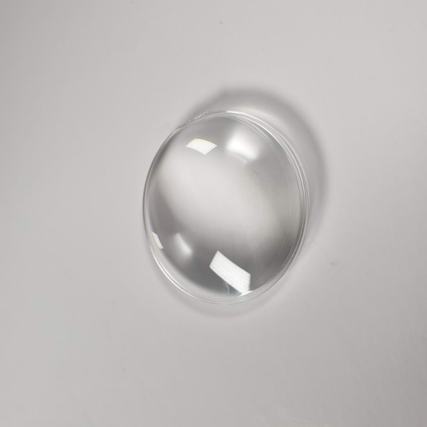 Koondav lääts, f = 42mm